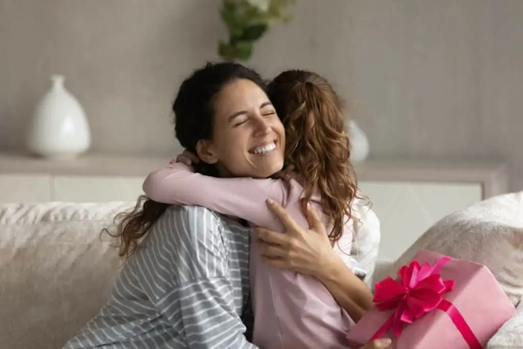 Woman hugging her child